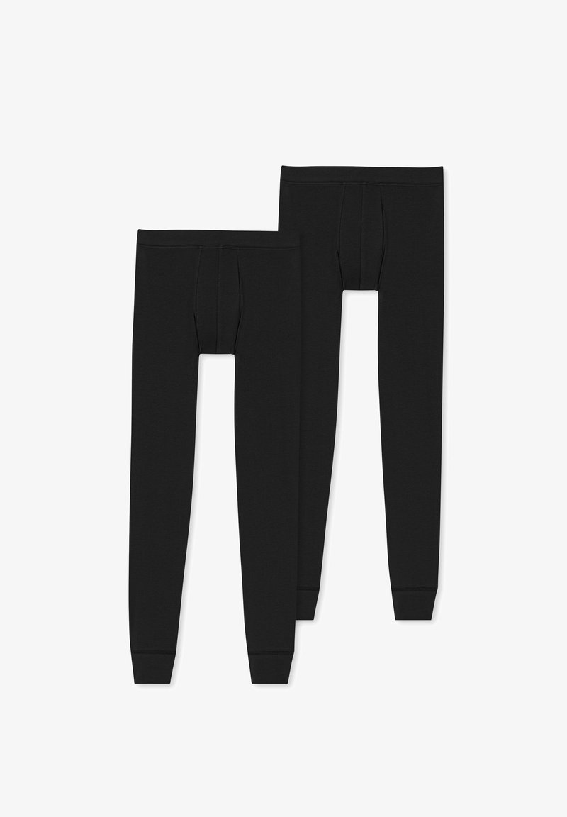 Leggings noirs en tissu mélangé de coton, avec un design simple, une taille élastique et des poignets fuselés, ainsi qu'un détail de poche à l'avant.