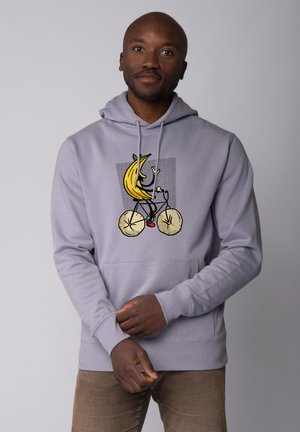 Lichtgrijze hoodie van een katoenmix met een voorkantzak, featuring een cartoon van een banaan die op een fiets rijdt, omrand met zwart en kleurrijke accenten.