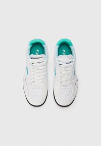 White athletic shoes with turquoise accents, featuring a textured upper, perforated toe, and contrasted black sole. Laces and padded collar included.
