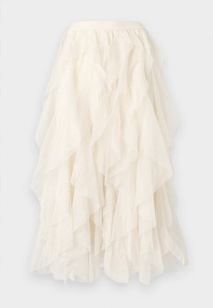 Cream layered tulle skirt with soft ruffles and subtle dotted texture, featuring a fitted waistband.