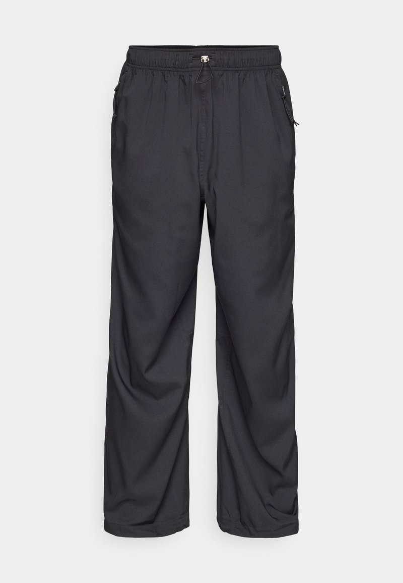 Schwarze Hose mit elastischem Bund und Seitentaschen, aus leichtem Stoff, mit lockerer Passform und glatter Textur.