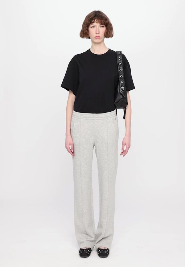 CHILL WINGS - Tracksuit bottoms - gris chine clai2