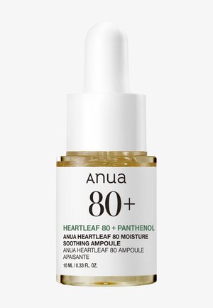 Ampoule hydratante apaisante Anua Heartleaf 80+ au panthénol avec compte-gouttes, flacon transparent de 10 ml, étiquette blanche avec texte noir et vert.