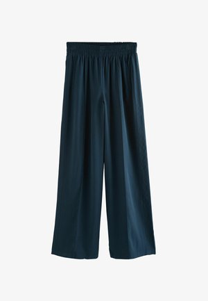 - Spodnie materiałowe