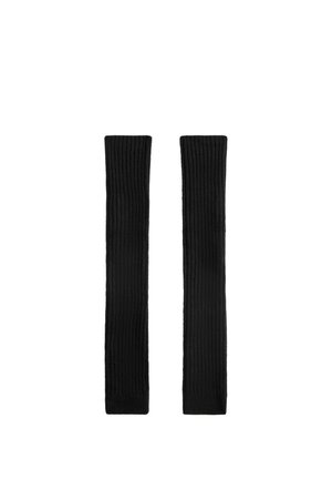 Deux longues bandes de tissu côtelé noir affichées côte à côte sur un fond blanc.