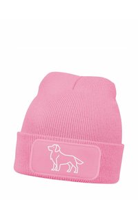 Pink knitted beanie with ribbed texture, fold-over cuff, and a white dog silhouette logo on a rectangular patch.