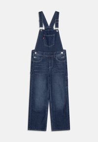 Džínové lacláče v tmavě modré barvě, s nastavitelnými ramenními popruhy, předními kapsami a zadní kapsou s označením značky. Široký střih nohavic.