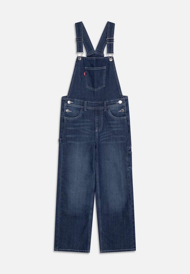 Džínové lacláče v tmavě modré barvě, s nastavitelnými ramenními popruhy, předními kapsami a zadní kapsou s označením značky. Široký střih nohavic.