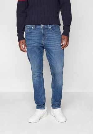 Jeans Tapered Fit - dark-blue denim