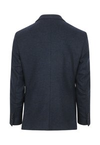 Donkerblauwe blazer met visgraatstructuur, met een reverskraag, slim fit en knopen aan de mouwen. Bevat een vent aan de achterkant.
