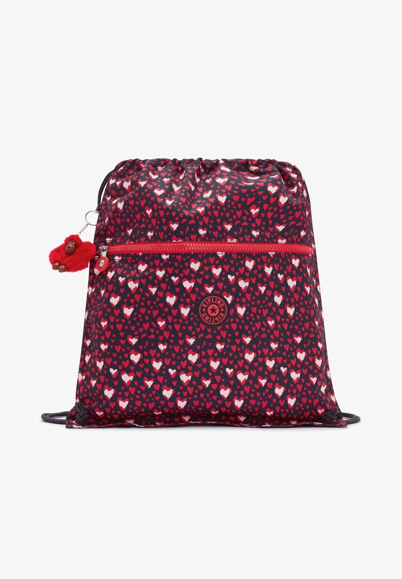 Sac à dos à cordon bleu marine et rouge avec motif de cœurs, poche zippée à l'avant et porte-clés singe rouge fixé sur le côté.