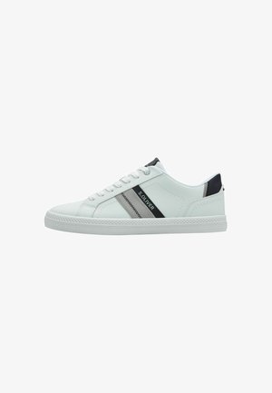 White synthetic sneakers with grey and black accent stripes, textured detail, lace closure, and a rubber sole for grip.