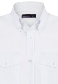 Witte button-up shirt met een gestructureerde kraag, twee voorzakken en een soepele, lichte stof. Label: Felix Hardy, maat M.