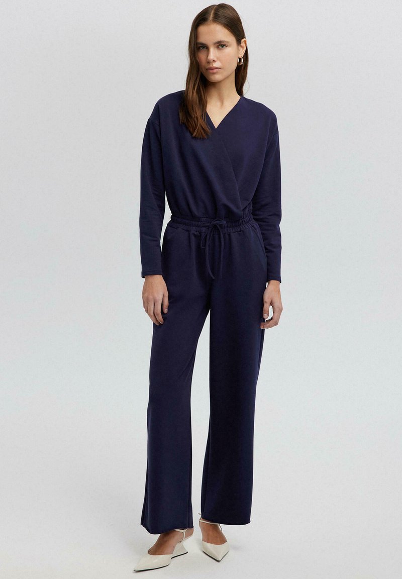 Touché Privé Jumpsuit donkerblauw Touché Privé Jumpsuit donkerblauw