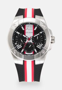 Black rubber strap watch with a stainless steel case, featuring a black dial, silver accents, red and white stripes, and three sub-dials.