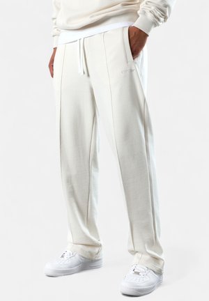 ESSENTIAL  - Tracksuit bottoms - cream