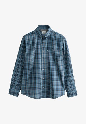 Langærmet skjorte i blåt ternet mønster med mørkere blå og hvide accenter. Har en knappet krave og en enkelt brystlomme.