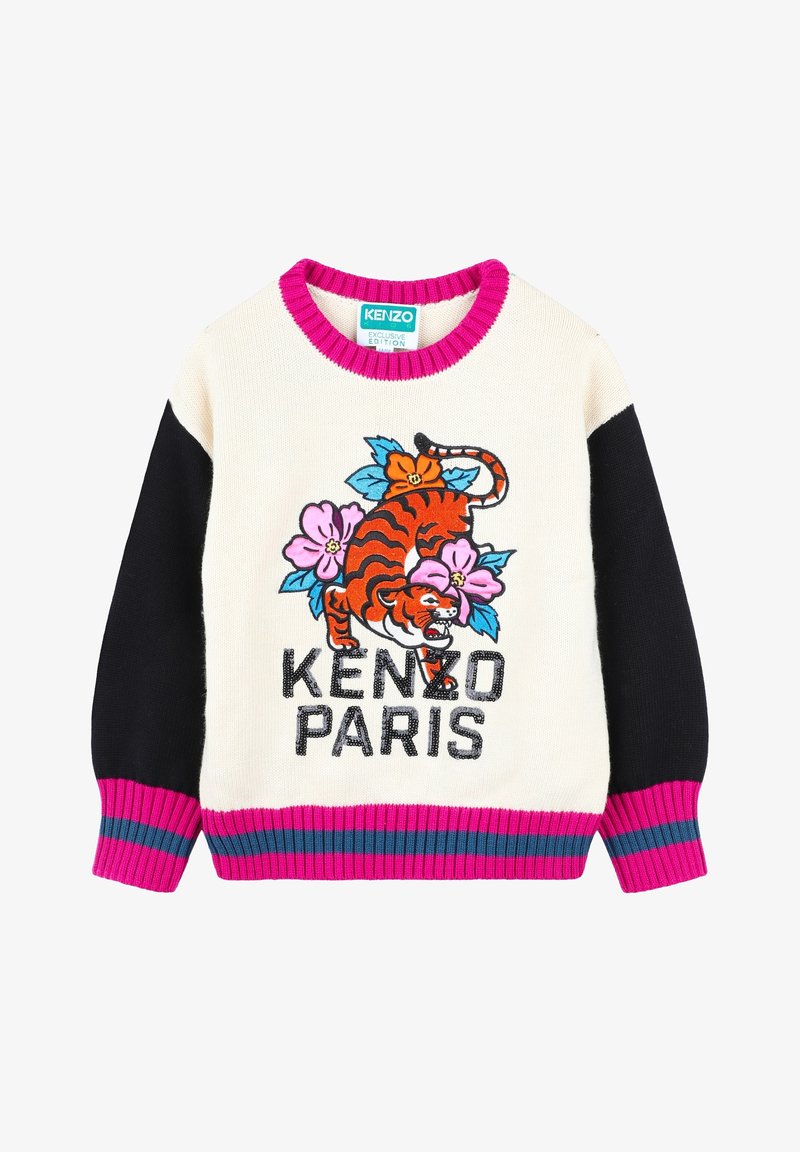 Pull blanc, noir et rose avec un tigre rugissant et un motif floral au-dessus du texte "Kenzo Paris" sur le devant.
