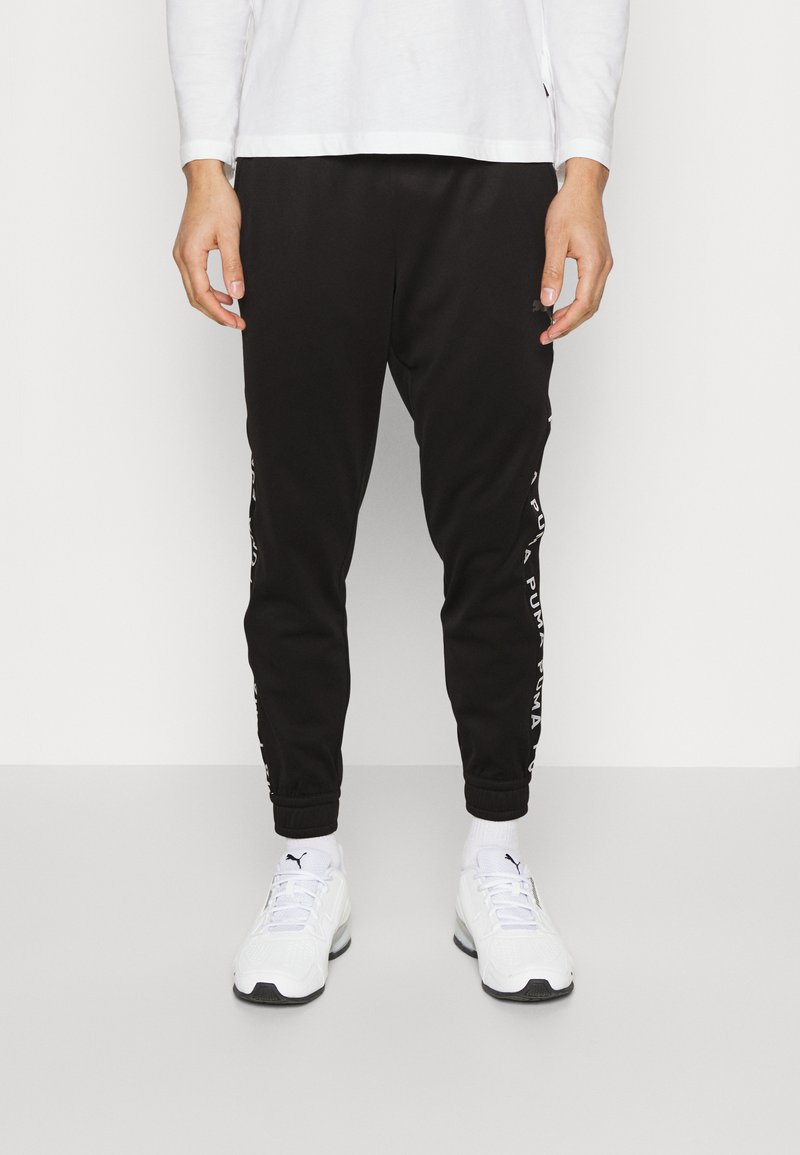 Puma FIT LIGHTWEIGHT Tracksuit bottoms black Zalando