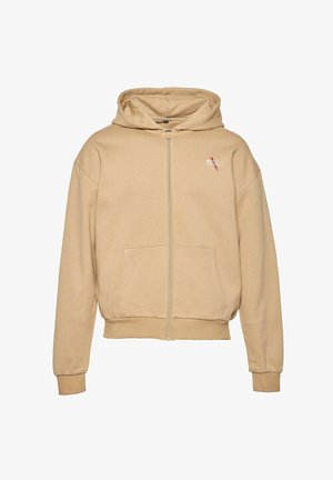 Béžová mikina na zips vyrobená z jemnej bavlny, s klokankou, rebrovanými manžetami a spodným okrajom a vyšitým logom na ľavej hrudi.