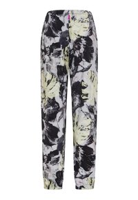 Kukkakuvioiset housut, joissa mustavalkoinen ja pastellikeltainen kuvio, joustava vyötärönauha ja kapeat lahkeet. Kevyt kangas.