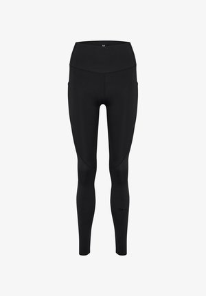 Zwarte naadloze sportlegging met hoge taille, flatlocknaden en een klein reflecterend logo op het onderbeen, afgebeeld op een witte achtergrond.