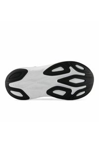 Löparskoinnersula med en svart gummiyttersula med vita accenter, texturerade mönster och en tydlig däckdesign för grepp.