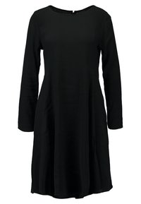 Svart klänning med långa ärmar, rund halsringning, en utsvängd silhuett och en texturerad tyg. Har en dragkedja bak för enkel påtagning.