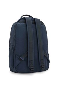 Dark blue nylon backpack with padded shoulder straps, large main compartment, side pocket, and subtle textural detailing.