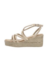 Sandalias de cuña beige con tiras de ante entrecruzadas, una hebilla ajustable en el tobillo y una suela de plataforma de yute texturizado.