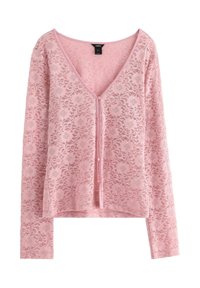 Rosa spetskofta med V-ringning, långa ärmar och knäppning fram. Blommönster över hela tyget, mjuk textur.