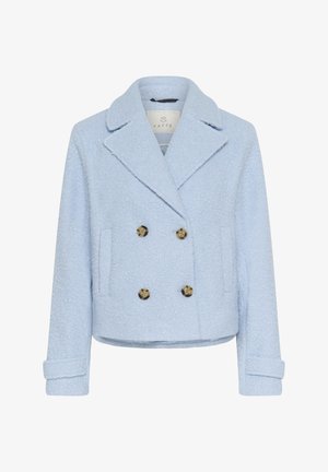 Light blue double-breasted jacket made of textured fabric featuring large bronze buttons and side pockets, with a notched collar and folded cuffs.