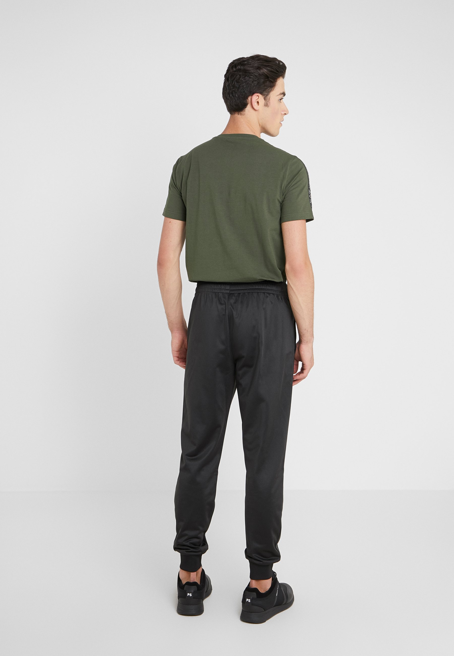 armani tracksuit dame