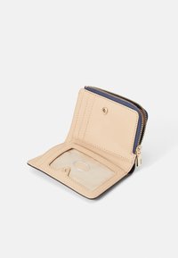 Beige leather wallet with a zip closure, interior card slot, and clear ID window. Features gold hardware and contrast stitching.