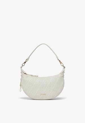 Sac à main blanc en forme de croissant avec des motifs géométriques perforés, des accessoires dorés, une fermeture éclair et une seule bandoulière.