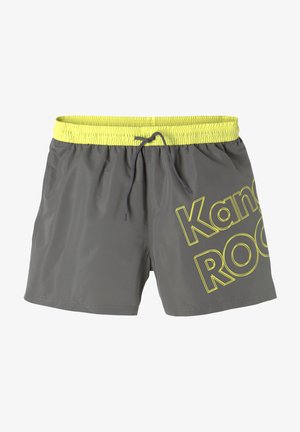 Gray swim shorts with a bright yellow elastic waistband, drawstring, and large yellow "Kangaroos" text on the side. Smooth texture.