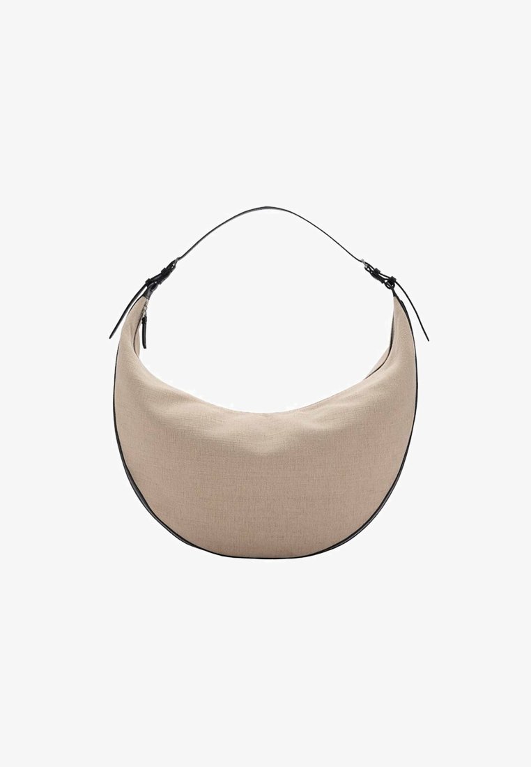 Beige fabric handbag with a curved shape, black zipper hardware, and a thin shoulder strap. Textured exterior with minimalistic design.