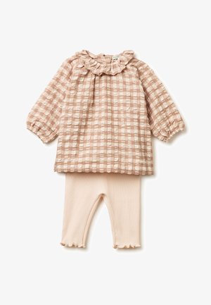 Ensemble bébé avec haut à manches longues beige texturé à carreaux, col à volants, assorti à des leggings côtelés beige clair avec des bords froncés.