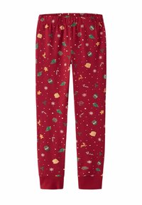 Pantaloni del pigiama rossi con vita elastica e stampa a tema natalizio che include alberi, bastoncini di zucchero, tamburi, casette di pan di zenzero, renne e fiocchi di neve.