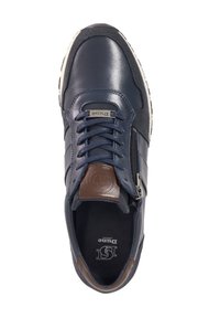 Navy blue leather sneaker with a smooth finish, brown leather accents, laces, side zipper, and a textured black rubber sole.