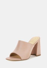 Sandalo aperto alla punta di colore rosa, realizzato in pelle liscia, con tacco spesso e design minimale. Logo dorato sulla soletta beige.