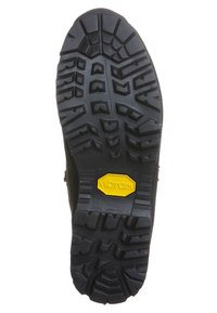 Μαύρη σόλα από καουτσούκ μπότες με βαθύ σχέδιο πέλματος και κίτρινο λογότυπο Vibram κοντά στο κέντρο.