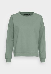 Felpa verde chiaro realizzata in tessuto misto cotone, con scollatura tonda, maniche lunghe e polsini e orlo a coste. Vestibilità comoda.