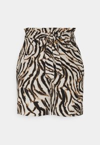 High-waisted shorts in cream fabric featuring a black and brown zebra stripe pattern, a tied belt, and a smooth, lightweight texture.