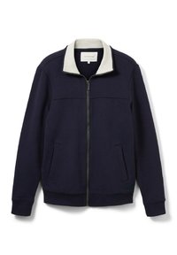 Felpa navy con zip e colletto crema, due tasche laterali, tessuto testurizzato e cuciture angolate per una vestibilità strutturata.