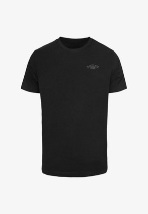 Schwarzes Baumwoll-T-Shirt mit Rundhals, kurzen Ärmeln und kleinem "Demon Inside"-Textlogo auf der linken oberen Brust.