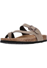 Sandal mit Korkfußbett aus hellbraunem Wildleder, mit gekreuzten Riemen und einer Metallschließe. Strukturierte schwarze Gummisohle für Grip.