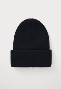 Knitted beanie in dark navy, featuring a fold-over cuff. Smooth texture with subtle stitching detail at the top, lightweight and warm.