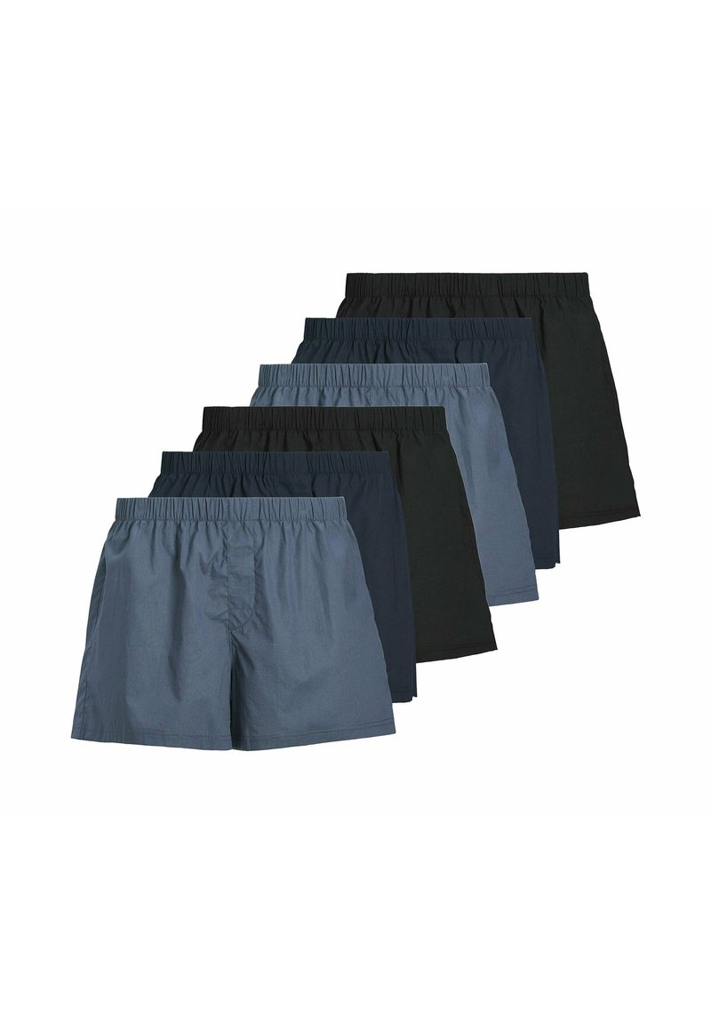 Conjunto de seis pares de pantalones cortos en diferentes tonos de azul y negro, con cinturas elásticas y un diseño simple y sin adornos.