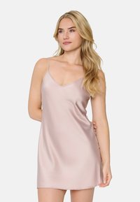 Abito in seta di colore rosa pallido con spalline regolabili, scollatura a V e una texture liscia e leggera.